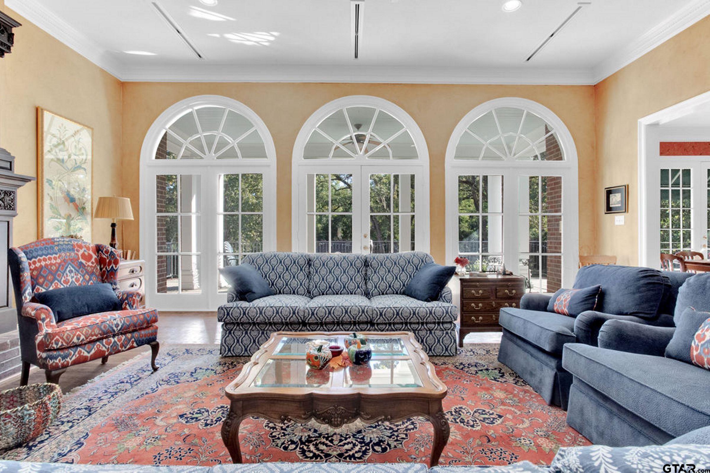 408 East Jolly Street Palestine, TX 75801 - Photo 16 of 48 a living room with furniture fireplace and a large window