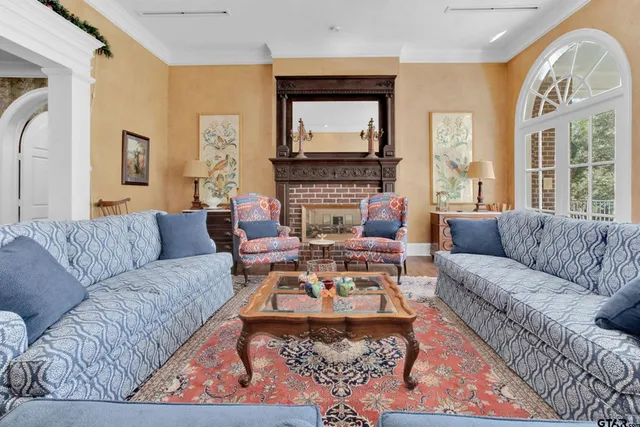 a view of a patio with a table and chairs