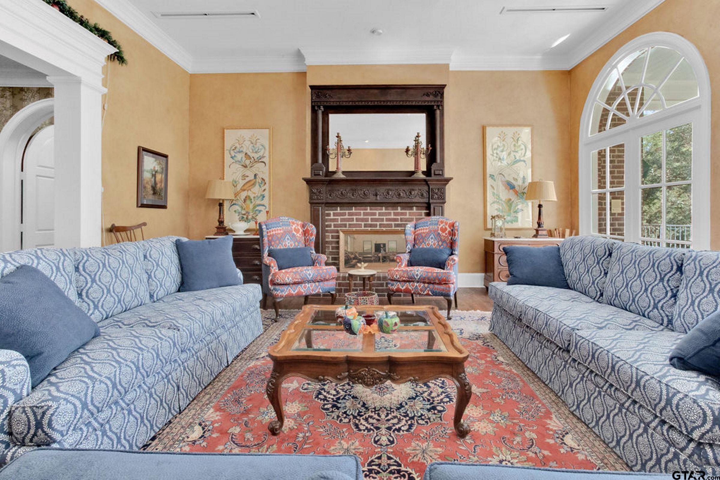 408 East Jolly Street Palestine, TX 75801 - Photo 17 of 48 a living room with furniture fireplace and a large window