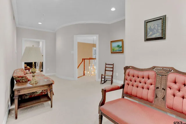 a bathroom with a sink a toilet and shower curtain