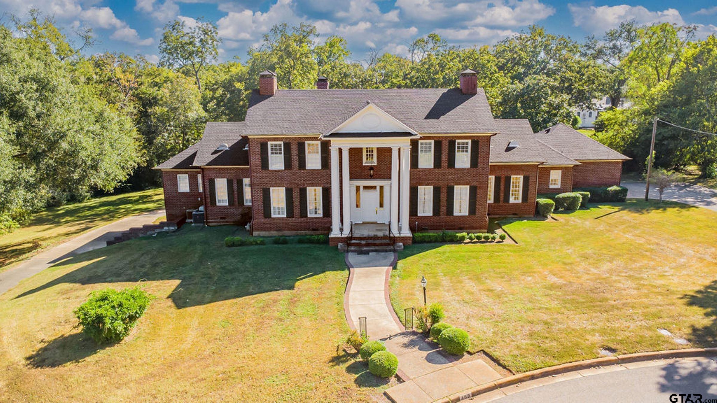 408 East Jolly Street Palestine, TX 75801 - Photo 4 of 48 a view of a house with a swimming pool