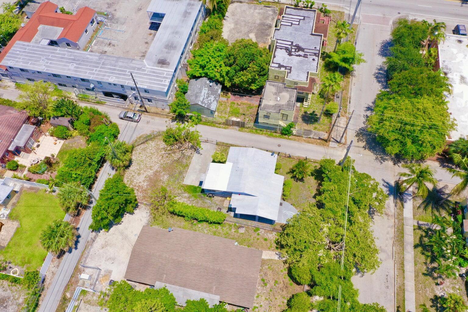 611 35th Street West Palm Beach, FL 33407 - Photo 5 of 9 an aerial view of a house with a garden