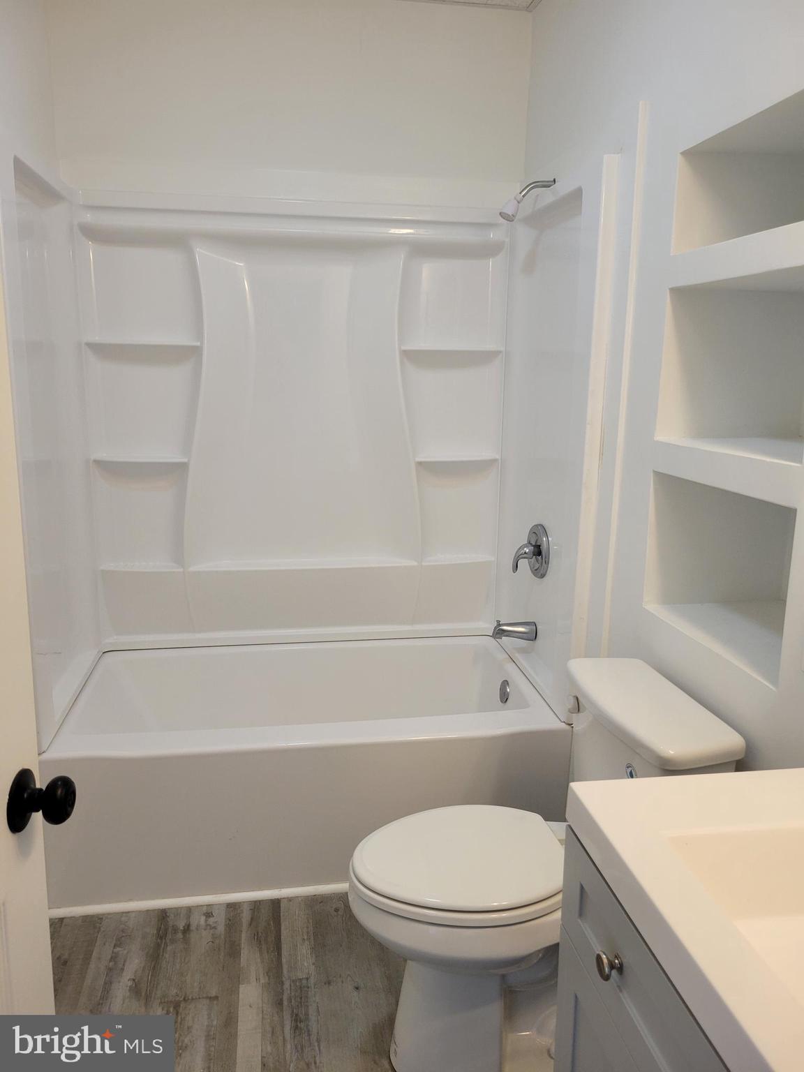 1801 South Main Street, Unit 6 Bechtelsville, PA 19505 - Photo 18 of 20 a bathroom with a toilet and a bathtub