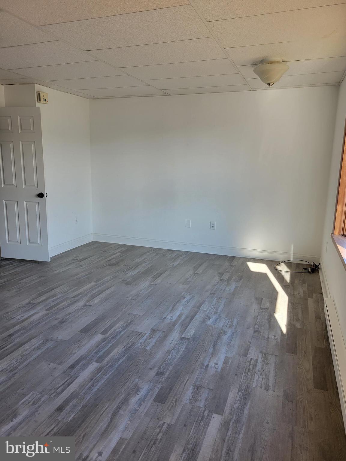 1801 South Main Street, Unit 6 Bechtelsville, PA 19505 - Photo 8 of 20 a view of a room with wooden floor