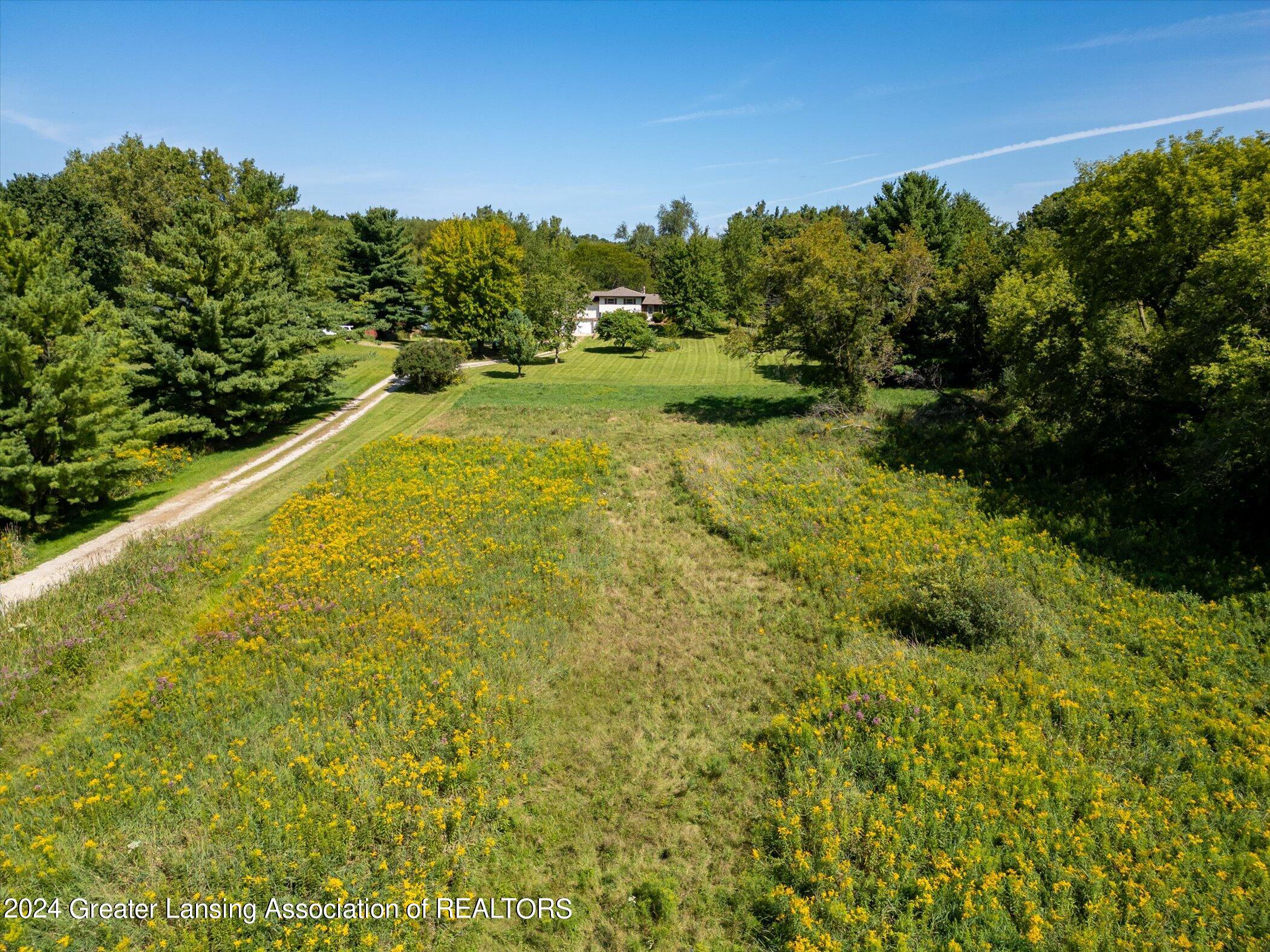 6099 Sleight Road Bath, MI 48808 - Photo 52 of 70 51-6099-Sleight-Rd-WindowStill-Real-Esta