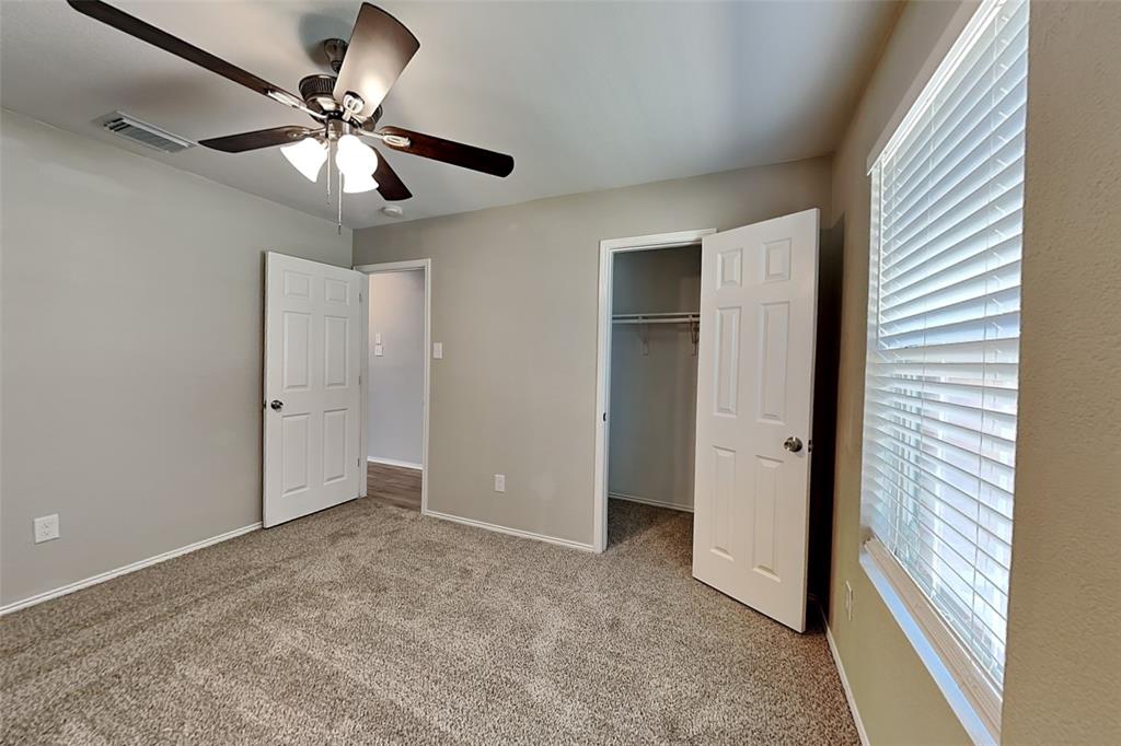 1420 Waterford Drive Little Elm, TX 75068 - Photo 16 of 23 a view of an empty room and a window