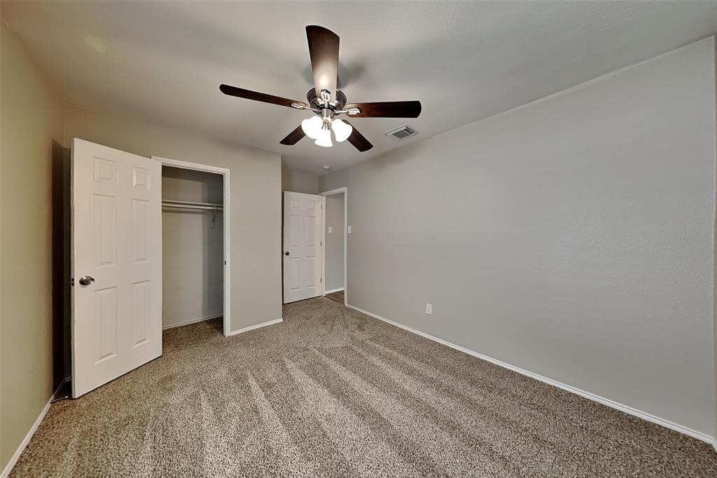 1420 Waterford Drive Little Elm, TX 75068 - Photo 17 of 23 a view of empty room with ceiling fan