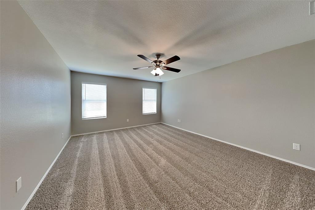 1420 Waterford Drive Little Elm, TX 75068 - Photo 8 of 23 a view of an empty room with a window