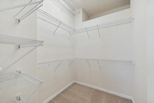 a view of a room with racks on the wall