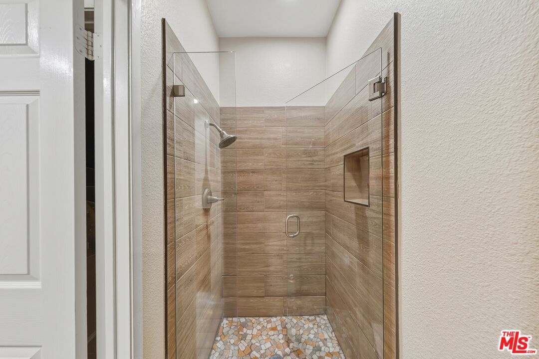 47395 Monroe Street, Unit 254 Indio, CA 92201 - Photo 15 of 21 a bathroom with a shower