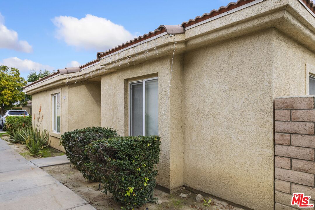 47395 Monroe Street, Unit 254 Indio, CA 92201 - Photo 2 of 21 a house with a outdoor space