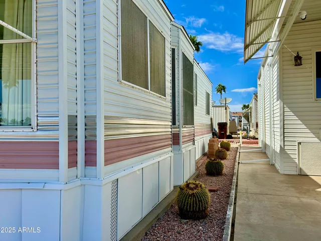 a view of a porch with seating space