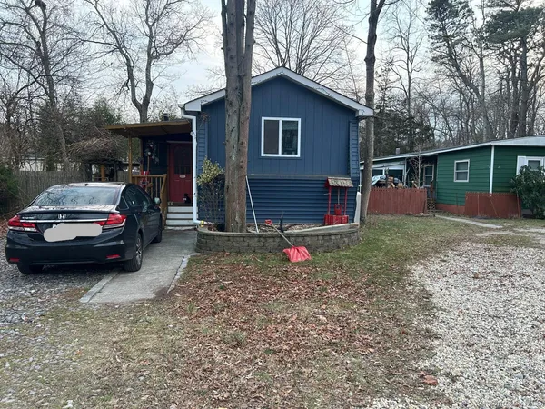 a car parked in front of a house