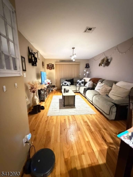 328 High Street, Unit 2 Elizabeth, NJ 07202 - Photo 2 of 13 a living room with furniture and a couch