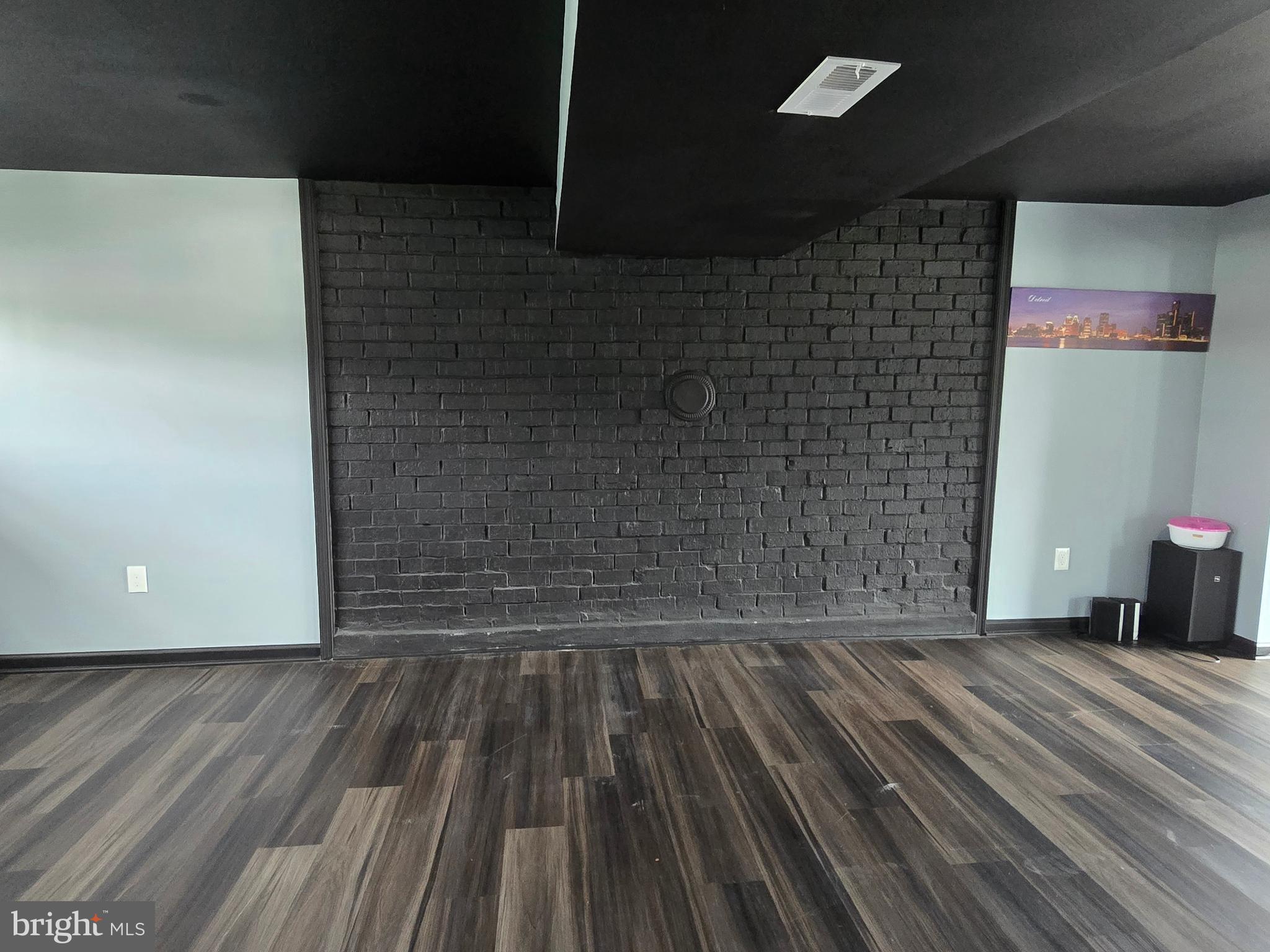 7513 Saffron Court Hanover, MD 21076 - Photo 33 of 42 a view of a room with wooden floor