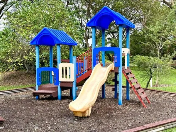 a view of a park with slide