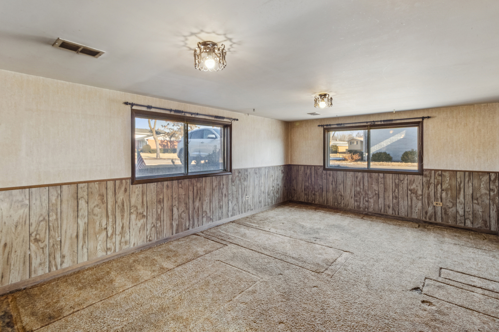 431 Ardmore Terrace Addison, IL 60101 - Photo 11 of 15 a view of an empty room with windows