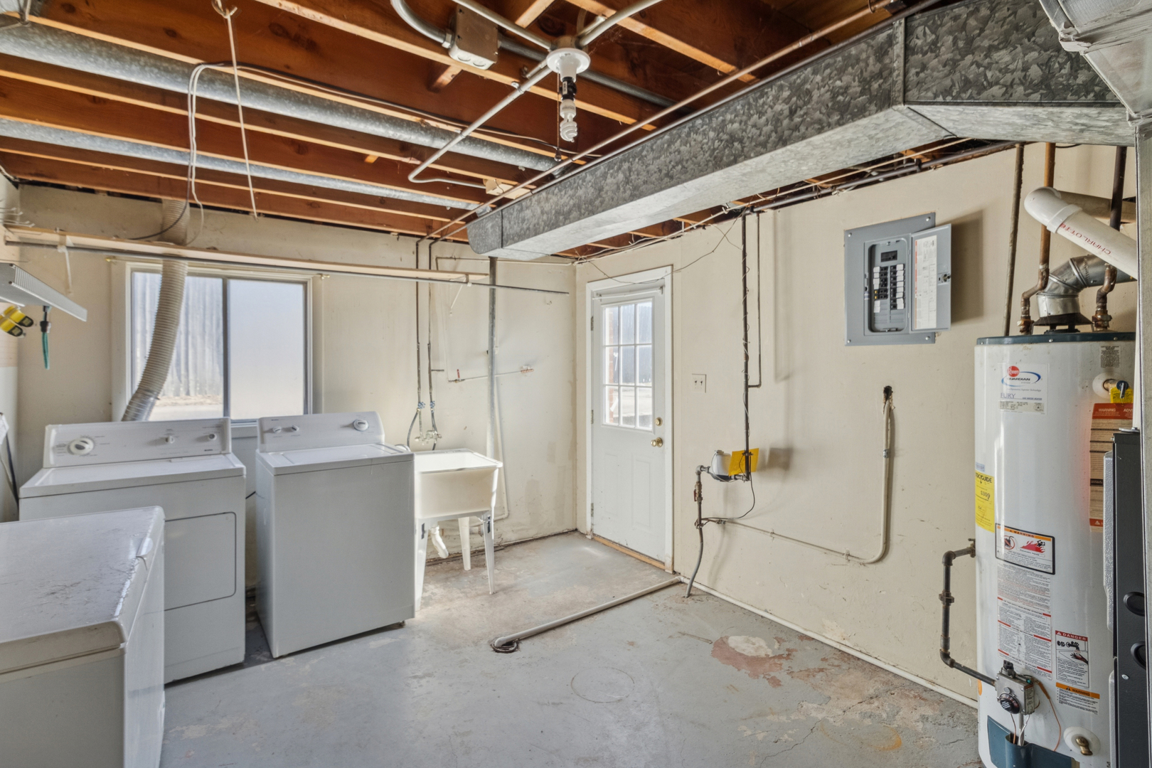 431 Ardmore Terrace Addison, IL 60101 - Photo 13 of 15 a room with a stove and a refrigerator