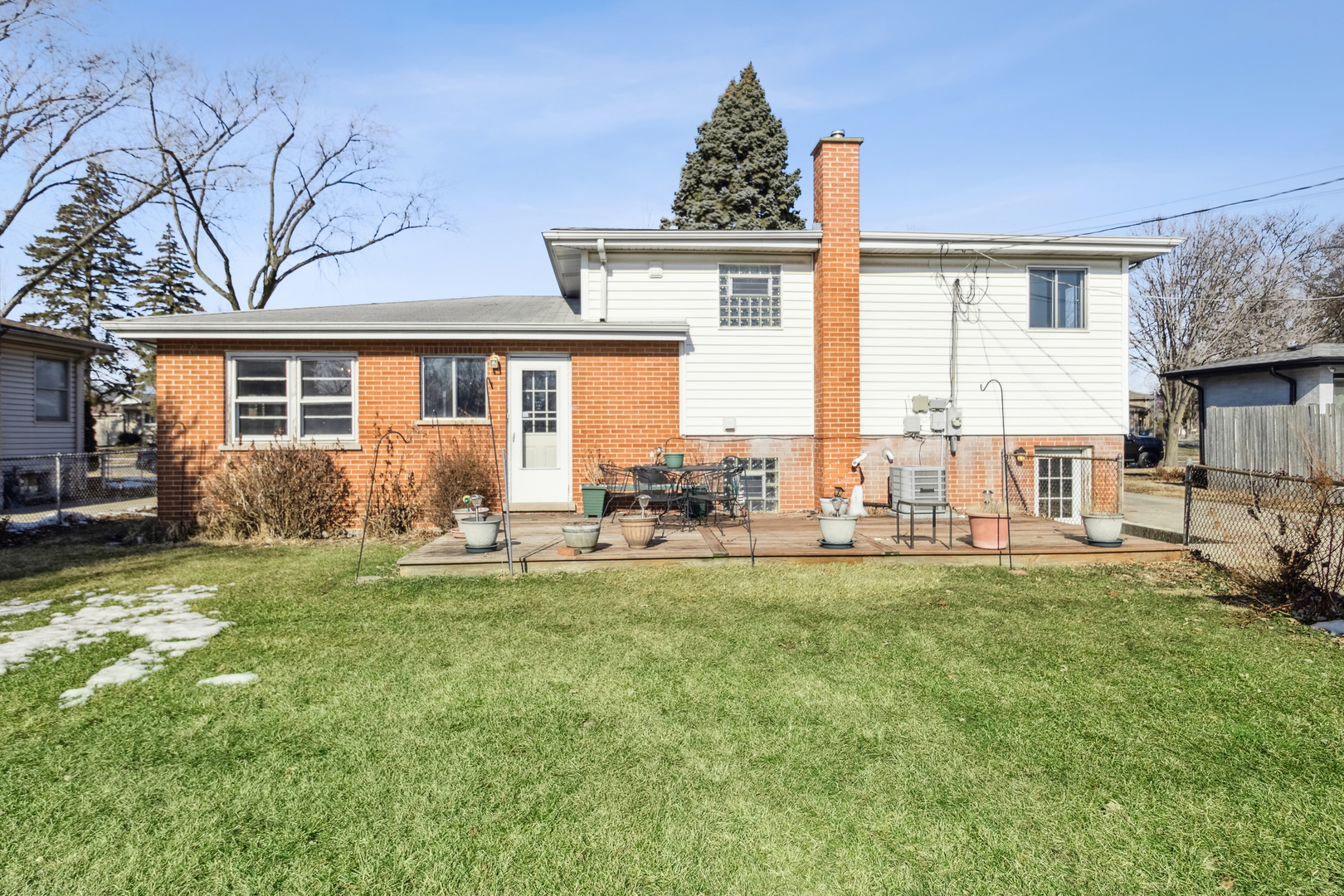 431 Ardmore Terrace Addison, IL 60101 - Photo 15 of 15 a view of a house with backyard porch and sitting area