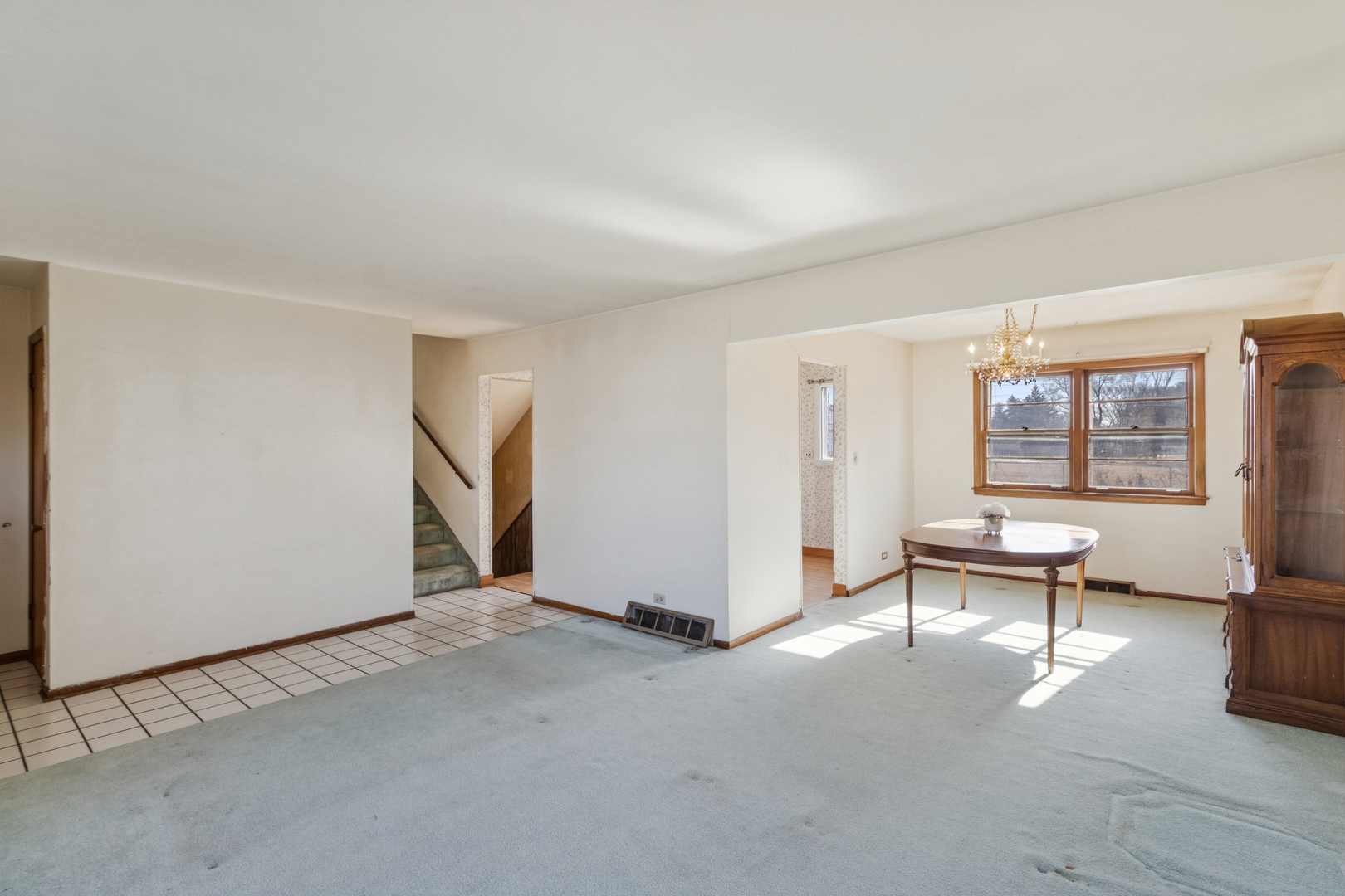 431 Ardmore Terrace Addison, IL 60101 - Photo 5 of 15 a view of an empty room with a window