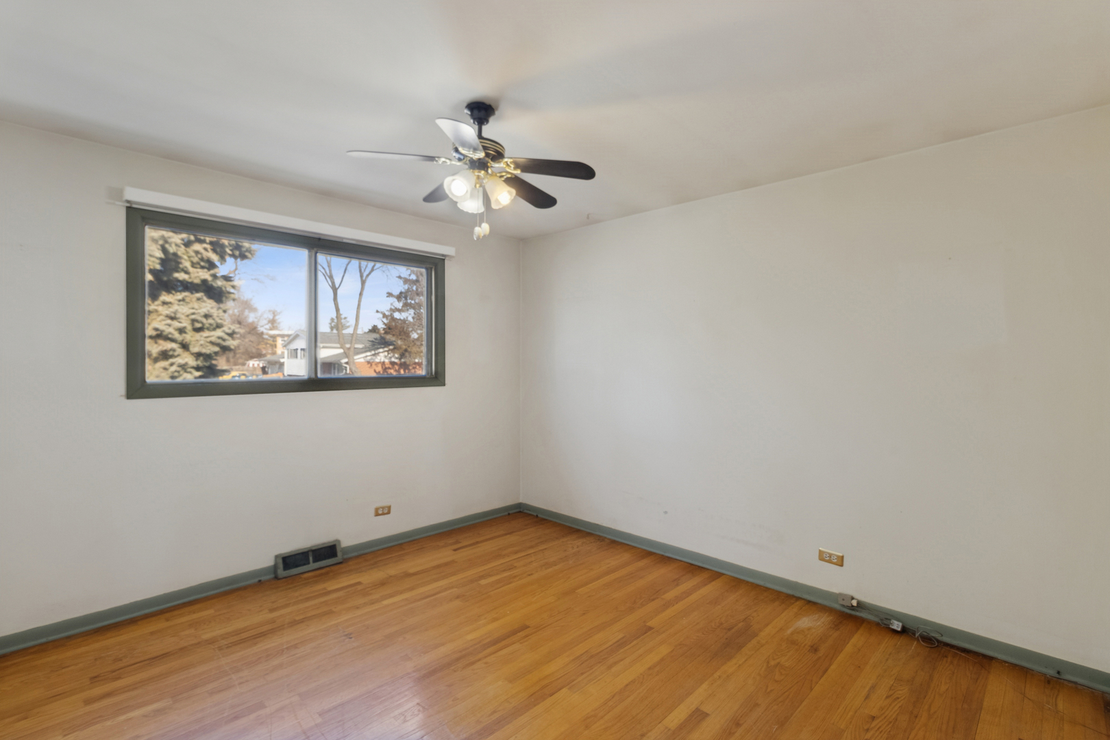 431 Ardmore Terrace Addison, IL 60101 - Photo 10 of 15 a view of empty room with wooden floor