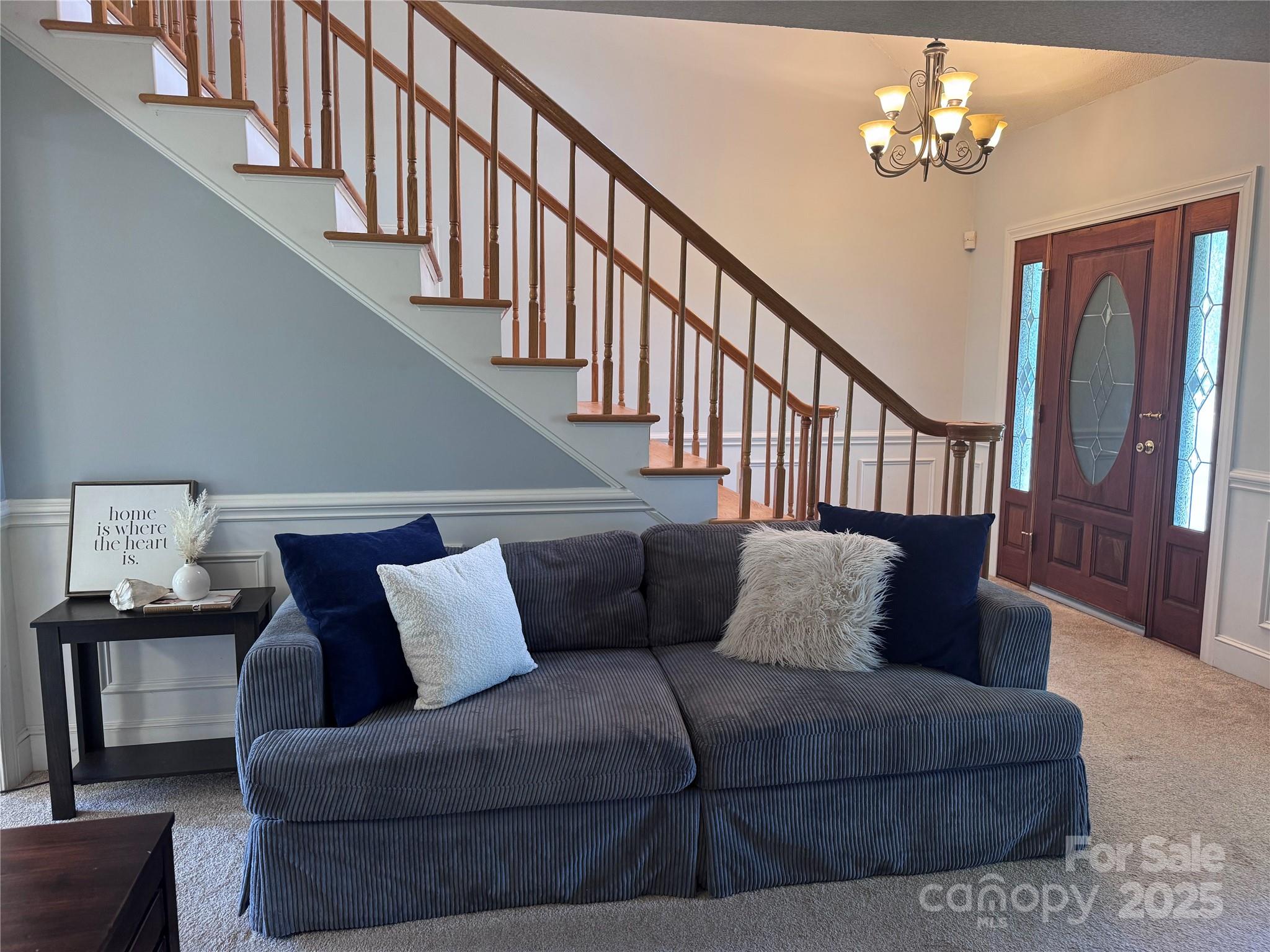 331 Polk Ford Road Stanfield, NC 28163 - Photo 4 of 33 a living room with furniture and wooden floor