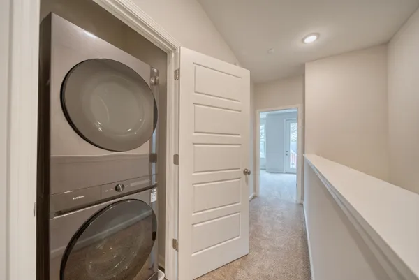 a view of a hallway with closet area