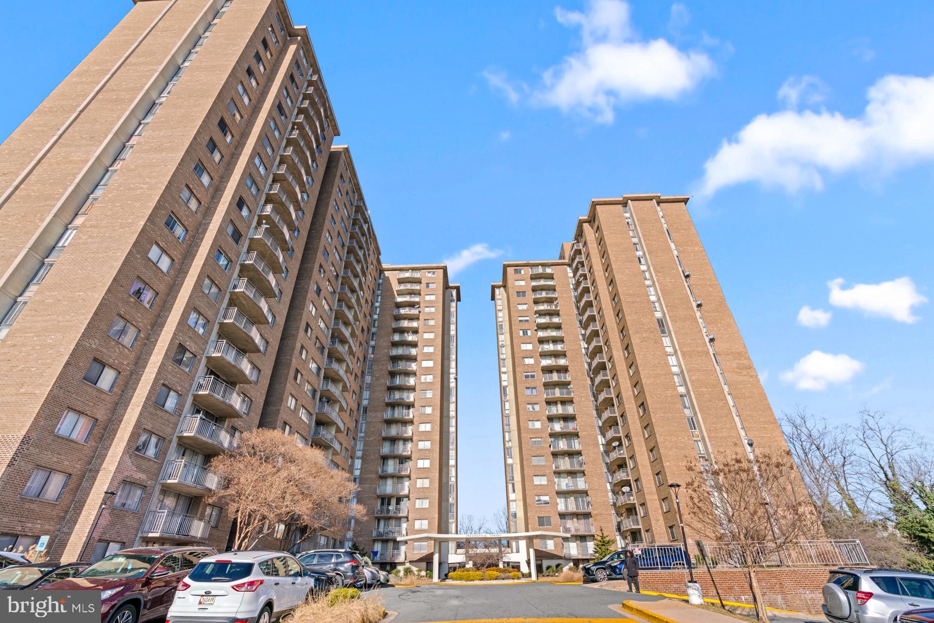 1836 Metzerott Road, Unit 215 Hyattsville, MD 20783 - Photo 1 of 36 a view of a city with tall buildings