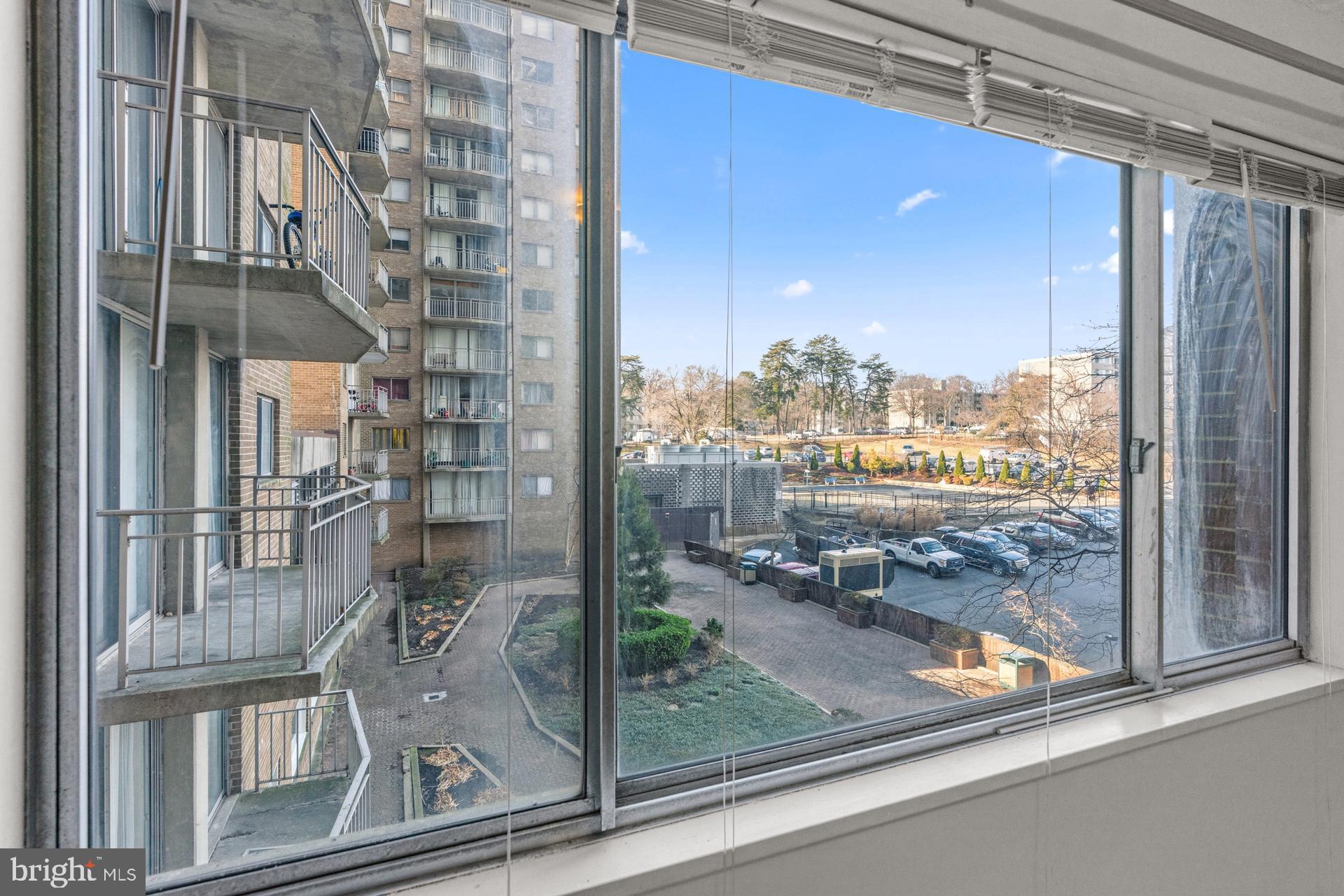 1836 Metzerott Road, Unit 215 Hyattsville, MD 20783 - Photo 11 of 36 a view of a porch with a floor to ceiling window