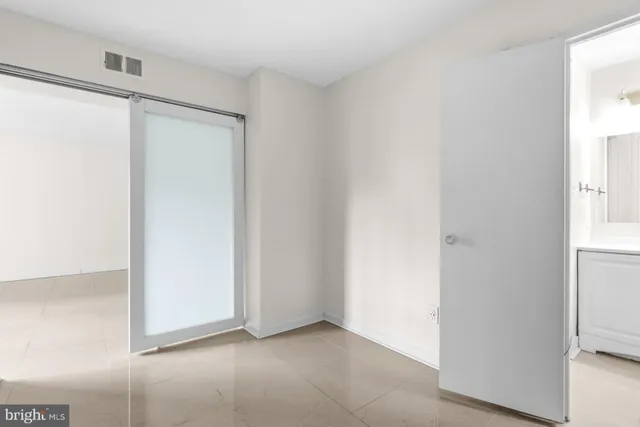 a view of an empty walk in closet