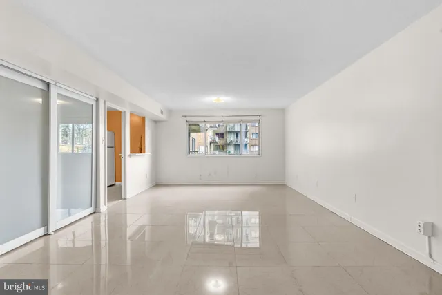 an empty room with window