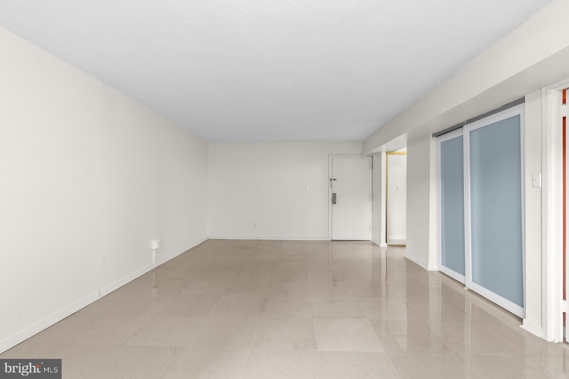 1836 Metzerott Road, Unit 215 Hyattsville, MD 20783 - Photo 6 of 36 an empty room with window