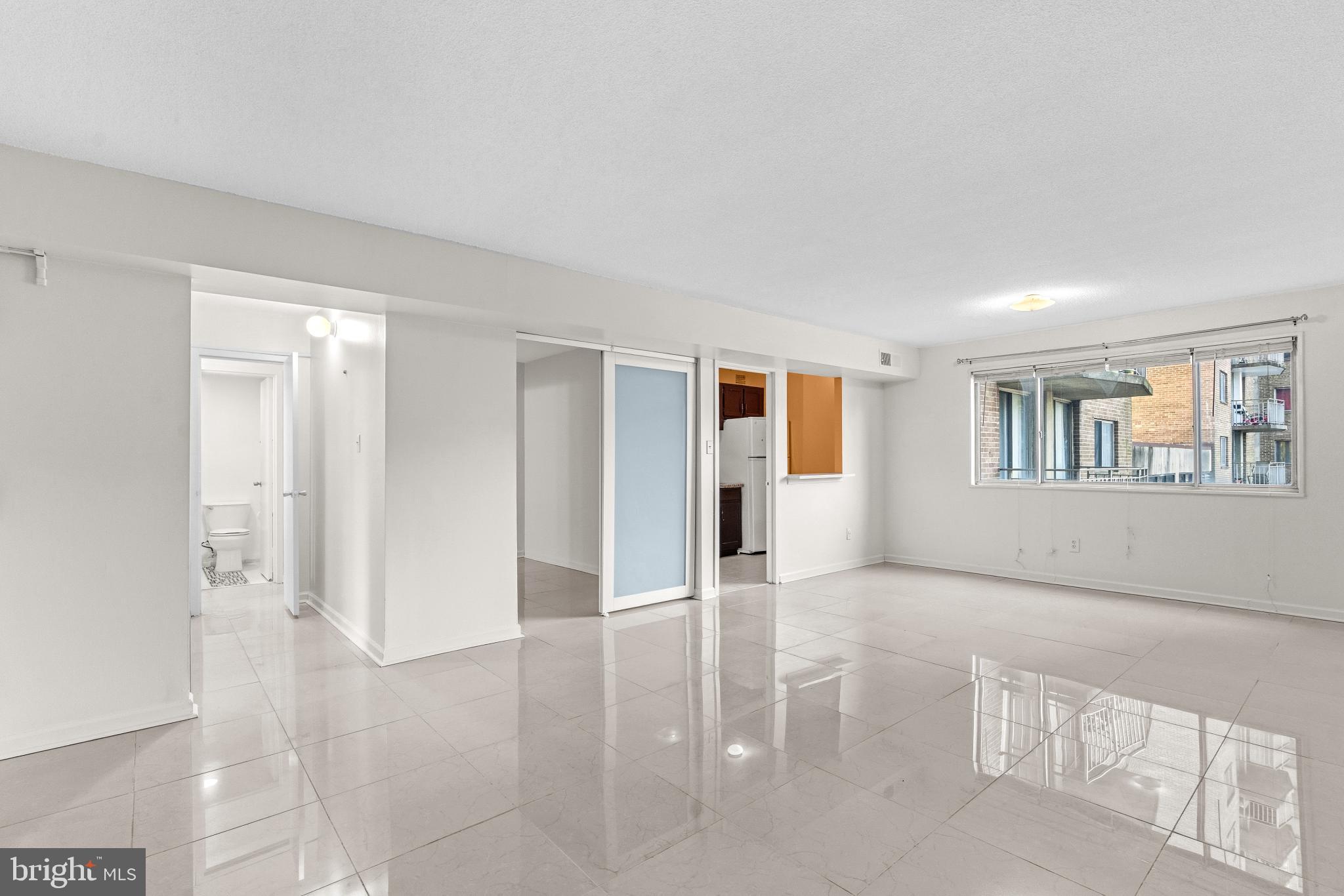 1836 Metzerott Road, Unit 215 Hyattsville, MD 20783 - Photo 9 of 36 a view of livingroom with window