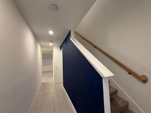 a view of hallway with stairs