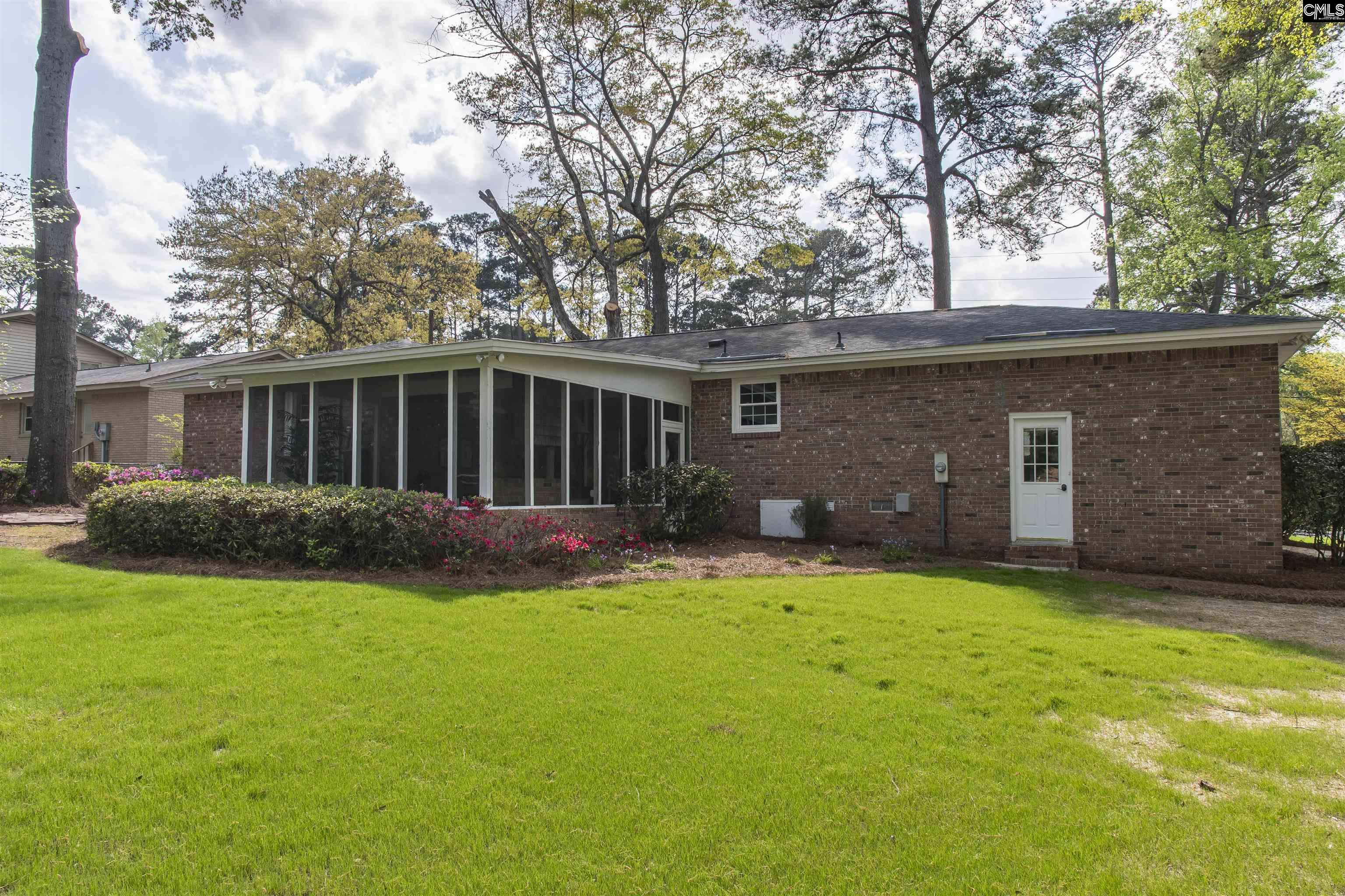 2309 Cunningham Road Columbia, SC 29210 - Photo 10 of 41 a view of a house with a yard and a tree
