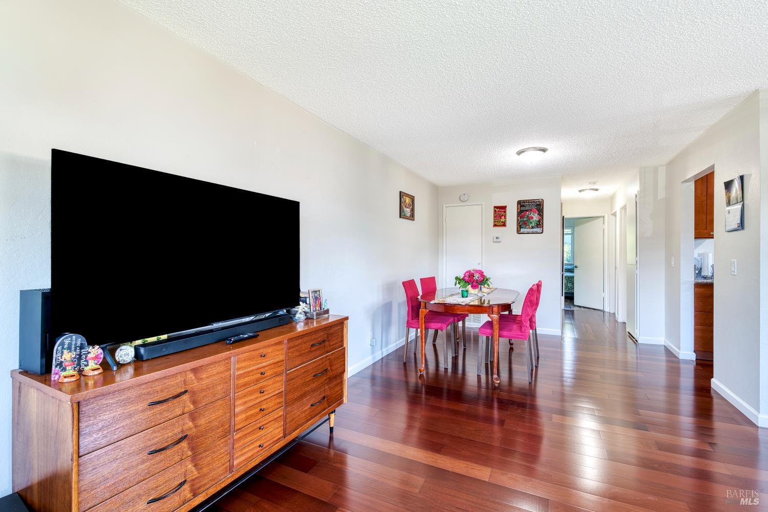 207 Bahia Place San Rafael, CA 94901 - Photo 6 of 21 a living room with furniture and a flat screen tv