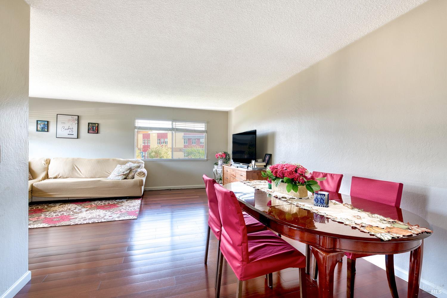 207 Bahia Place San Rafael, CA 94901 - Photo 8 of 21 a view of a dining room with furniture and wooden floor