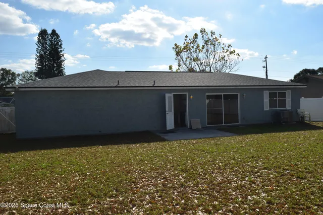 a house view with a garden space