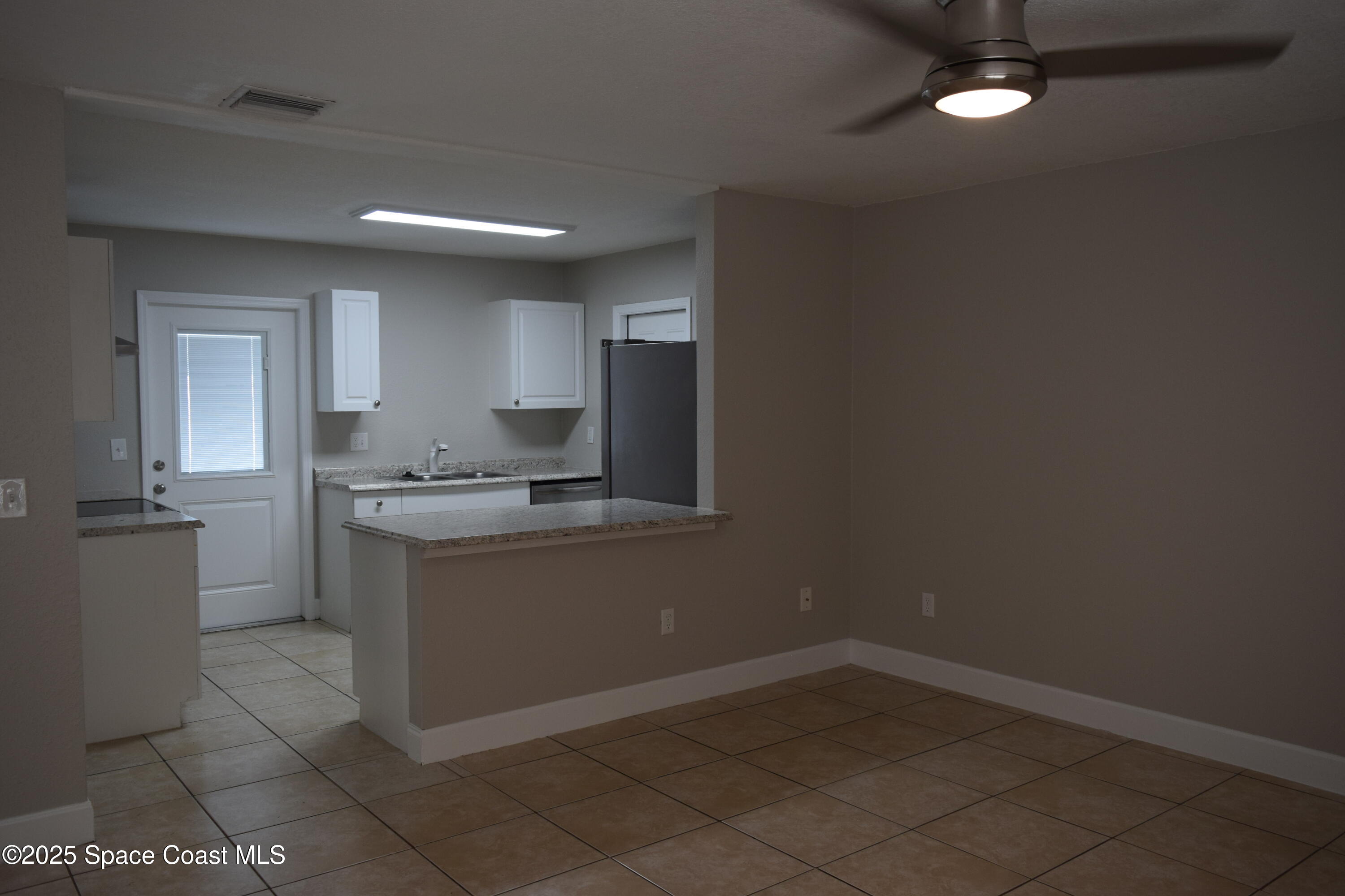 1657 Norwood Street Palm Bay, FL 32905 - Photo 5 of 34 DSC_0177