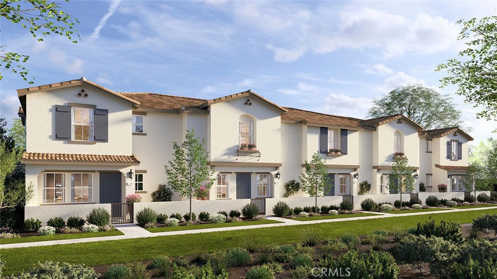 8545 Serrano Oaks Road Jurupa Valley, CA 92509 - Photo 1 of 2 a front view of a house with a yard