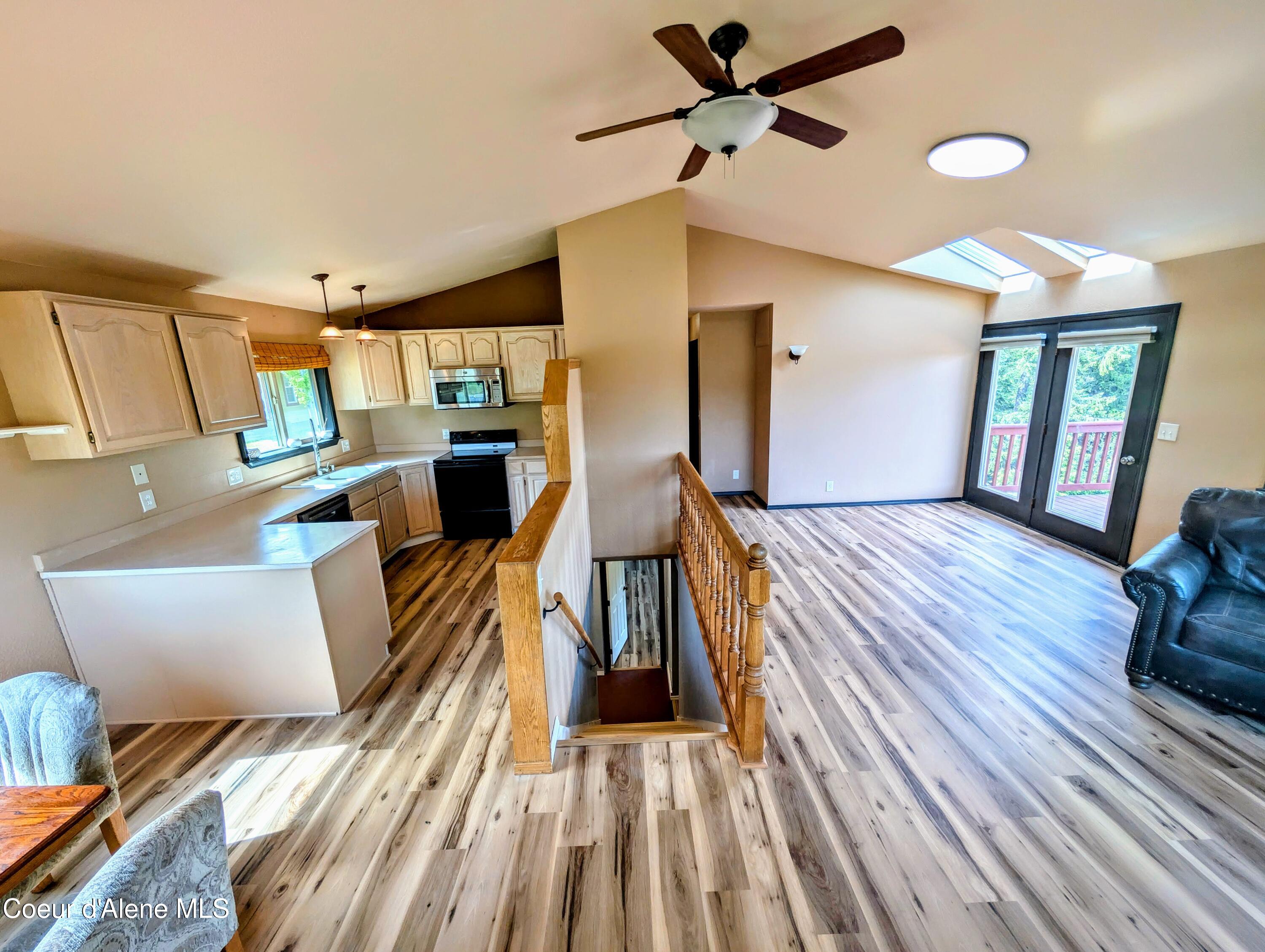 1703 South High Ranch Road Coeur D'Alene, ID 83814 - Photo 12 of 51 Stairs kitchen to living room