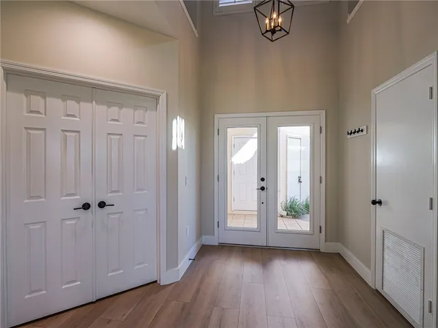 wooden floor with white walls