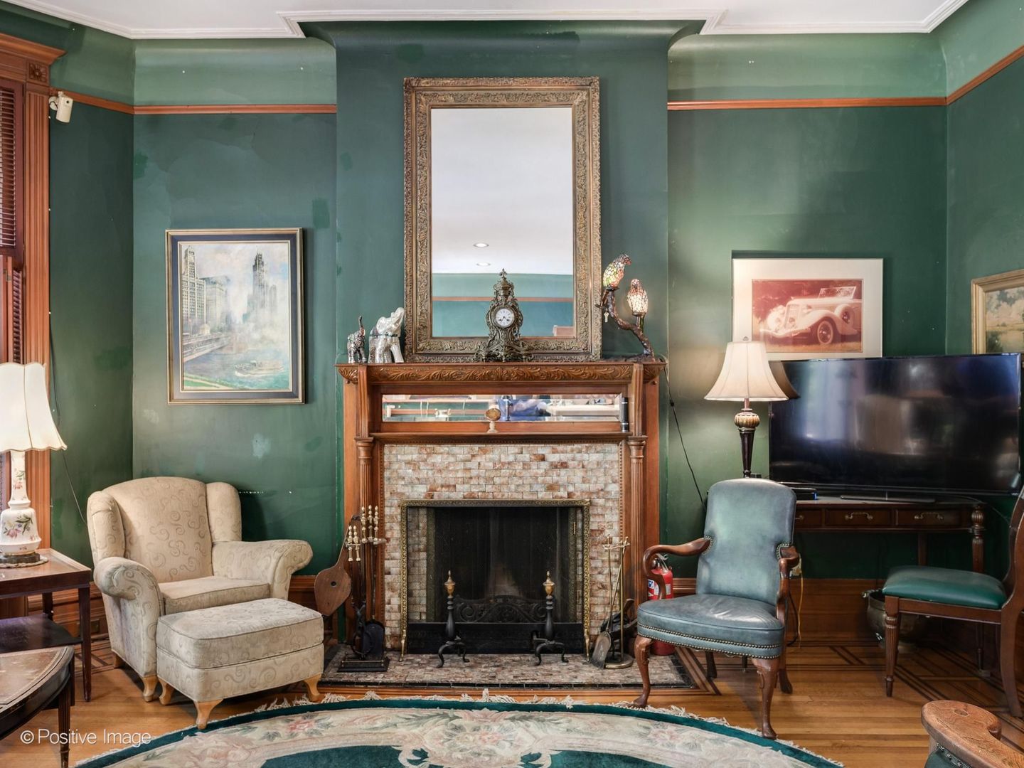 33 East Division Street Chicago, IL 60611 - Photo 6 of 34 a living room with furniture a flat screen tv and a fireplace