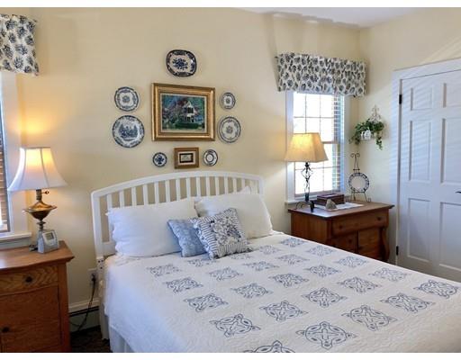 12 Long Beach Road Gloucester, MA 01930 - Photo 15 of 30 a bedroom with a bed and painting on the wall