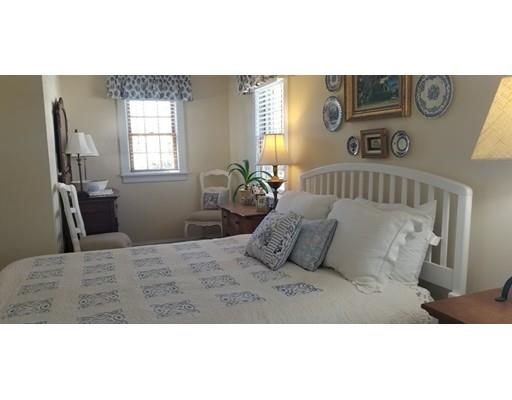 12 Long Beach Road Gloucester, MA 01930 - Photo 16 of 30 a bedroom with a bed and wooden floor