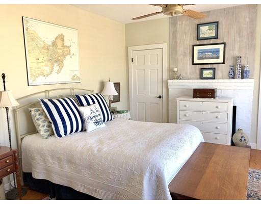 12 Long Beach Road Gloucester, MA 01930 - Photo 18 of 30 a bedroom with a bed and a painting on the wall