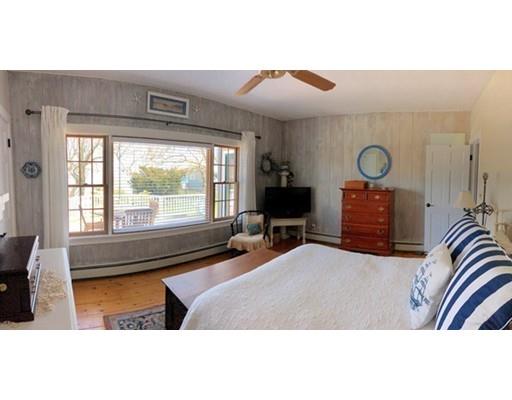 12 Long Beach Road Gloucester, MA 01930 - Photo 19 of 30 a bedroom with a bed and window