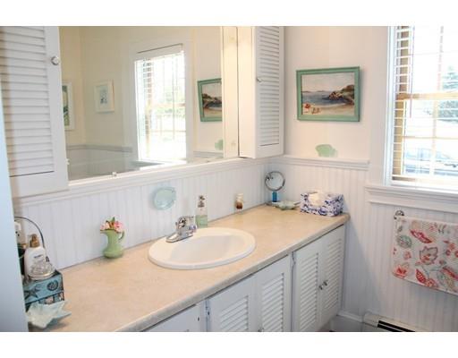 12 Long Beach Road Gloucester, MA 01930 - Photo 20 of 30 a bathroom with a granite countertop sink mirror and a window