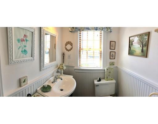 12 Long Beach Road Gloucester, MA 01930 - Photo 21 of 30 a bathroom with a tub a sink and a window