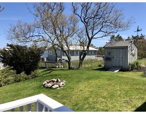 12 Long Beach Road Gloucester, MA 01930 - Photo 23 of 30 a backyard of a house with lots of green space